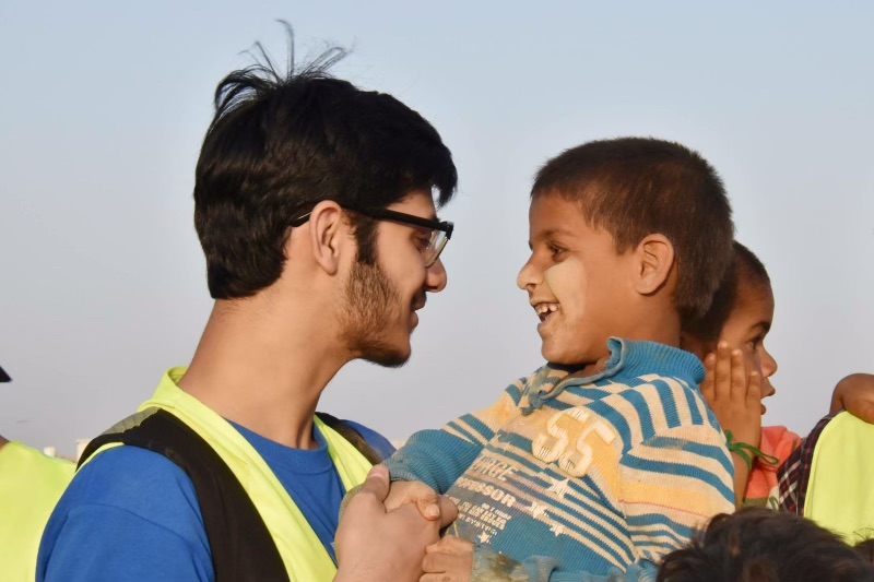 Team members organizing food supplies for refugees during Ramadan in Jordan